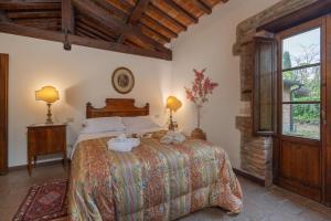 Ένα ή περισσότερα κρεβάτια σε δωμάτιο στο Residence Il Casale