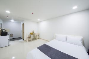 Kuchyň nebo kuchyňský kout v ubytování J Raum Resort