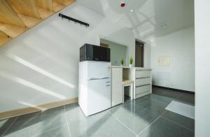 Kuchyň nebo kuchyňský kout v ubytování J Raum Resort