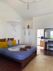 Postel nebo postele na pokoji v ubytování Palm villa Mirissa hotel&spa