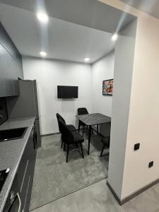Η κουζίνα ή μικρή κουζίνα στο Cozy new apartment in parkent st