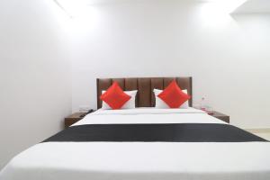 Postel nebo postele na pokoji v ubytování Hotel Max Marina Delhi Airport