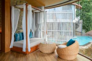 Der Swimmingpool an oder in der Nähe von Sinae Phuket - SHA Extra Plus