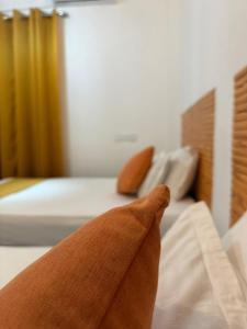 Postel nebo postele na pokoji v ubytování Thambara Resort