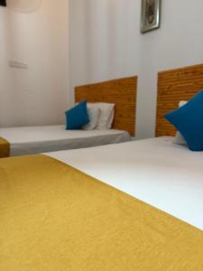 Postel nebo postele na pokoji v ubytování Thambara Resort + 27 fotografií