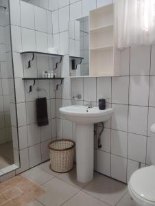 Koupelna v ubytování Roche Kerlan Apartments