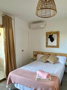 Posteľ alebo postele v izbe v ubytovaní S_Apartamento