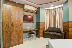 Χώρος καθιστικού στο Hotel Diamond Palace, Madiwala