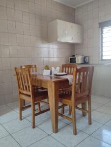 Kuchyň nebo kuchyňský kout v ubytování Roche Kerlan Apartments