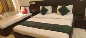 Postel nebo postele na pokoji v ubytování Hotel Fringo