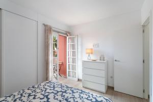 Ένα ή περισσότερα κρεβάτια σε δωμάτιο στο Bungalow Playa Las Burras +16 φωτογραφίες