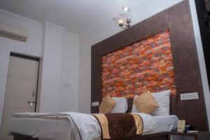 Voodi või voodid majutusasutuse Hotel Ruby toas