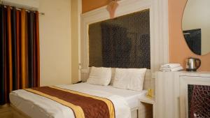 Voodi või voodid majutusasutuse Hotel Ruby toas