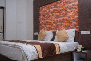 Voodi või voodid majutusasutuse Hotel Ruby toas