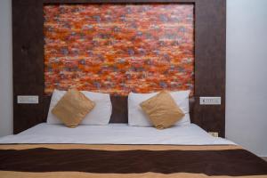 Voodi või voodid majutusasutuse Hotel Ruby toas