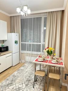 Dapur atau dapur kecil di Прекрасные и уютные апартаменты в классной локации