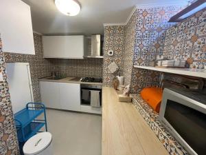 Kuchyňa alebo kuchynka v ubytovaní Comfortable Apartment in the Heart of Rome, 65m², City View