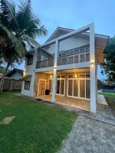 a villa with a view of a house at Aanya Villa by the Beach in Mirissa