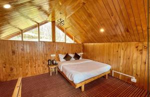 Postel nebo postele na pokoji v ubytování Hamlet Homestay