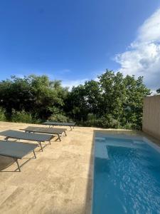 Πισίνα στο ή κοντά στο Superbe villa vue mer et piscine