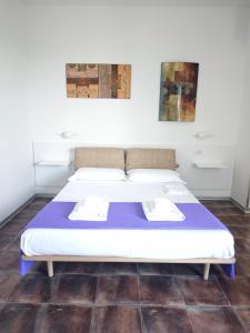 Postel nebo postele na pokoji v ubytování B&B Torrefano + 33 fotografií
