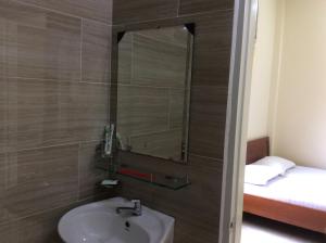 Koupelna v ubytování Quốc Ân Motel + 37 fotografií
