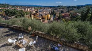 a view of a city from the roof of a house at Panoramic villa near Florence in Pescia