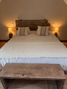 Postel nebo postele na pokoji v ubytování Au Détour des Châteaux