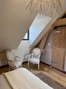 Posezení v ubytování Au Détour des Châteaux