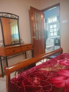 A bed or beds in a room at Snowdrop Resident