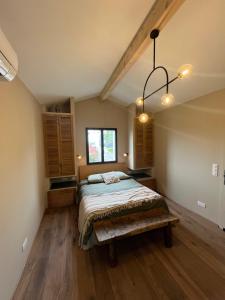 Postel nebo postele na pokoji v ubytování Magnifique chambre pour une pause détente à Ahetze