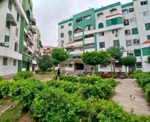 a view of the courtyard of an apartment building at Gadou Rooms in Port Said