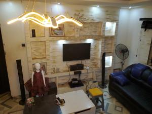TV a/nebo společenská místnost v ubytování Zaddy Room + 7 fotografií