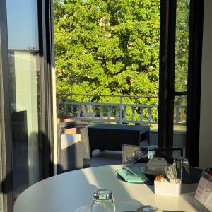 a table in a room with a large window at Villa Angelina in Aquino +41 photos