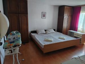 Postel nebo postele na pokoji v ubytování Apartman Jana