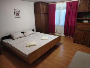 Postel nebo postele na pokoji v ubytování Apartman Jana