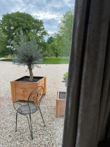 Zahrada ubytování Au Détour des Châteaux