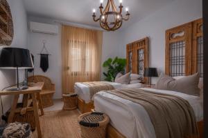 Postel nebo postele na pokoji v ubytování Mare Monte Villa