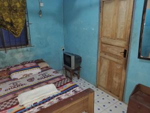 Katil atau katil-katil dalam bilik di Top Guest Room