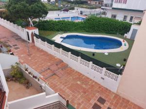 Bazén v ubytování Casa Mercurio 31 nebo v jeho okolí