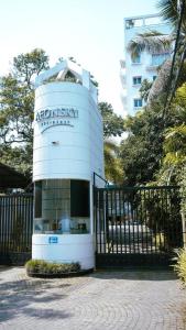 a building with a sign on the front of it at AEONSKY RESIDENCE Luxury One Bedroom Apartment in Negombo