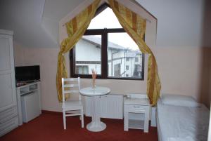 Postel nebo postele na pokoji v ubytování Guest House ANEX