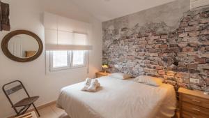 Posteľ alebo postele v izbe v ubytovaní Casa Siempre Sayalonga by Ruralidays + 27 fotografií