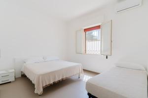 Postel nebo postele na pokoji v ubytování Acqua Chiara - Salento Selection