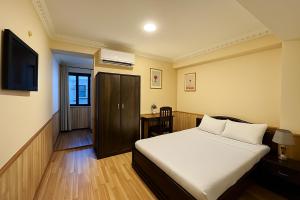 Voodi või voodid majutusasutuse Boudha Mandala Hotel toas