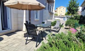 Vonkajšia záhrada v ubytovaní Apartment Gary