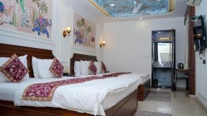 Voodi või voodid majutusasutuse Hotel Ruby toas