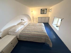Postel nebo postele na pokoji v ubytování Casa Agave, sul porto di Malfa - Salina
