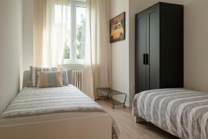 Postel nebo postele na pokoji v ubytování Pontida42