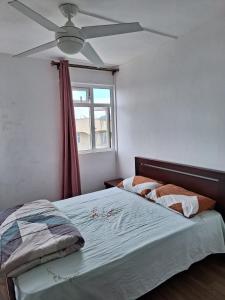 Ένα ή περισσότερα κρεβάτια σε δωμάτιο στο Vantri - Ramsagur Complex